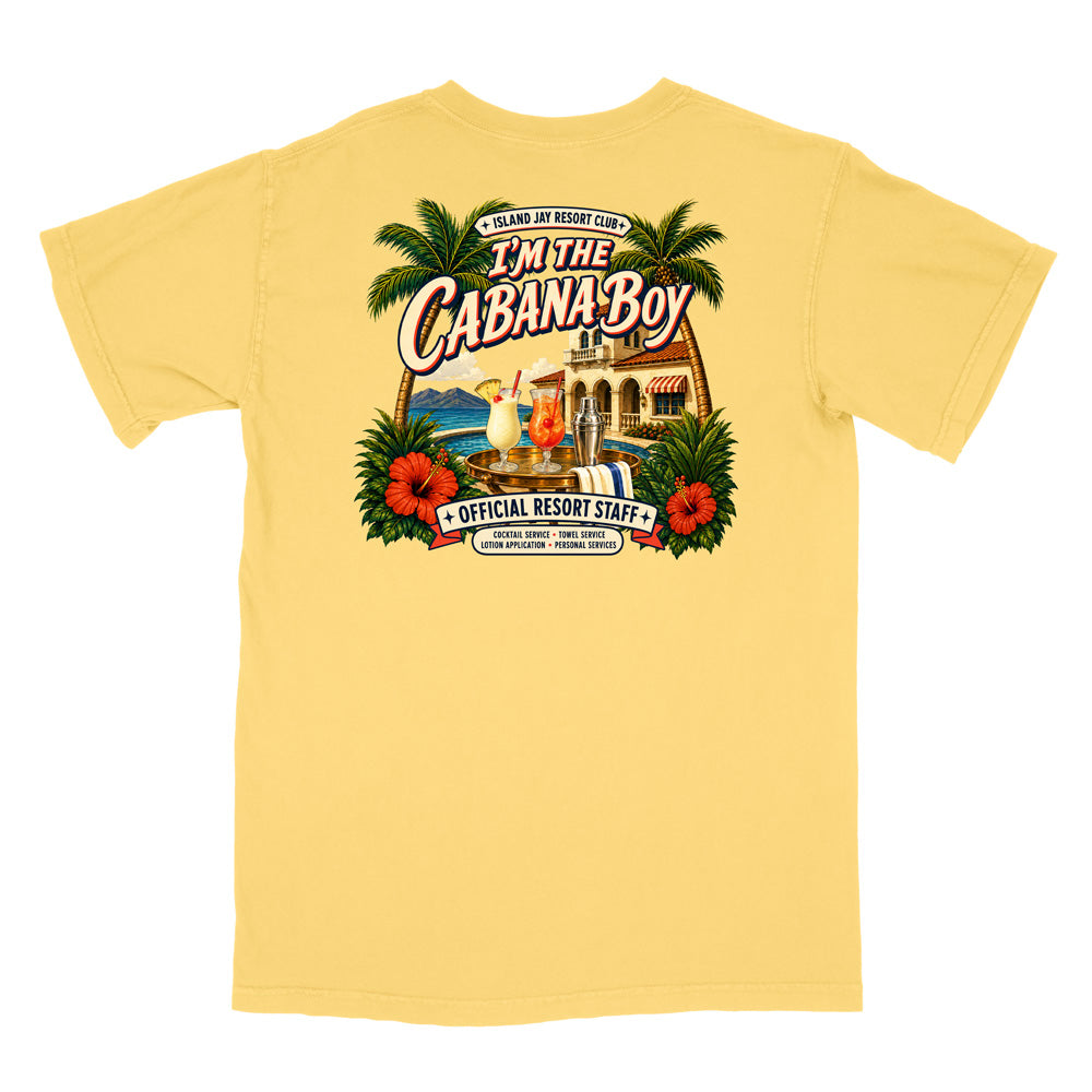 A pale yellow short-sleeve t-shirt with a large, colorful retro graphic on the back. The graphic features palm trees, red hibiscus flowers, a beach bar scene, and the text 'I'm The Cabana Boy' and 'Official Resort Staff'.