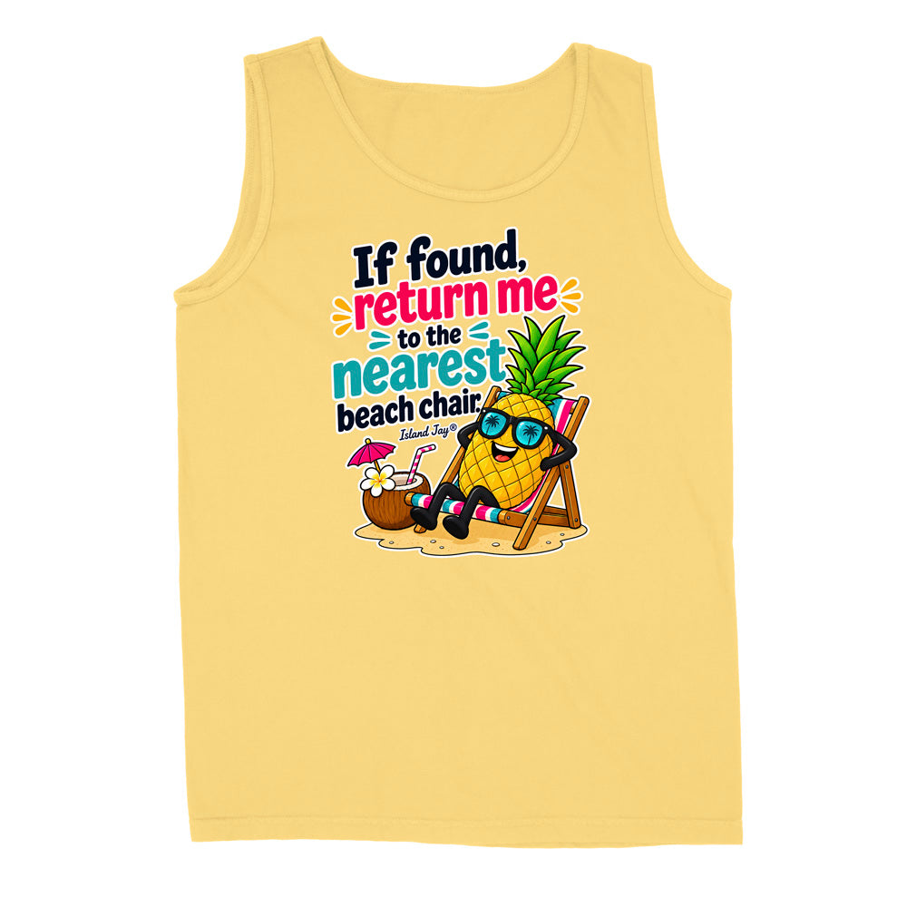 A pale yellow sleeveless tank top with a colorful graphic of a pineapple character wearing sunglasses and reclining in a beach chair, next to a coconut drink, with the text 'If found, return me to the nearest beach chair' and 'Island Style' printed on the front.