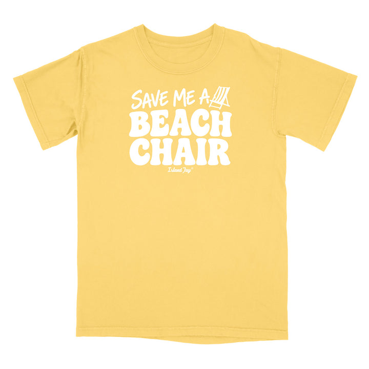 A yellow short-sleeve t-shirt with a white graphic print on the front that reads 'SAVE ME A BEACH CHAIR' 