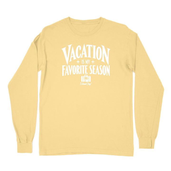 A pale yellow long-sleeve t-shirt with a white graphic print on the front that reads 'VACATION IS MY FAVORITE SEASON' 