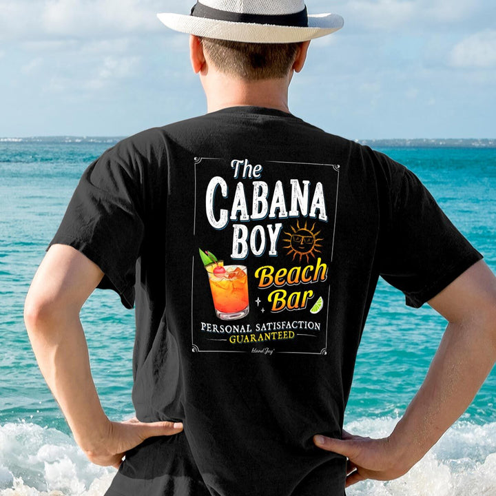 Man on a beach wearing a funny Cabana Boy Beach Bar T-Shirt
