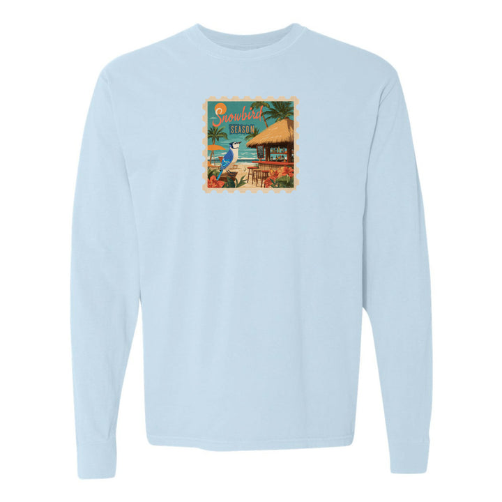 Light blue sweatshirt with a colorful graphic on the chest against a white background