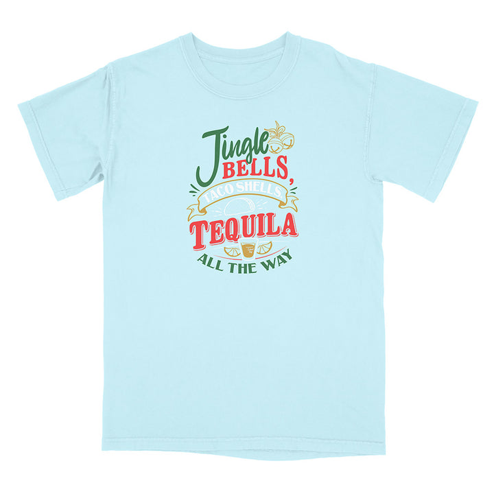 Light blue t-shirt with colorful graphic and text reading "Jingle Bells Taco Shells Tequila All The Way".