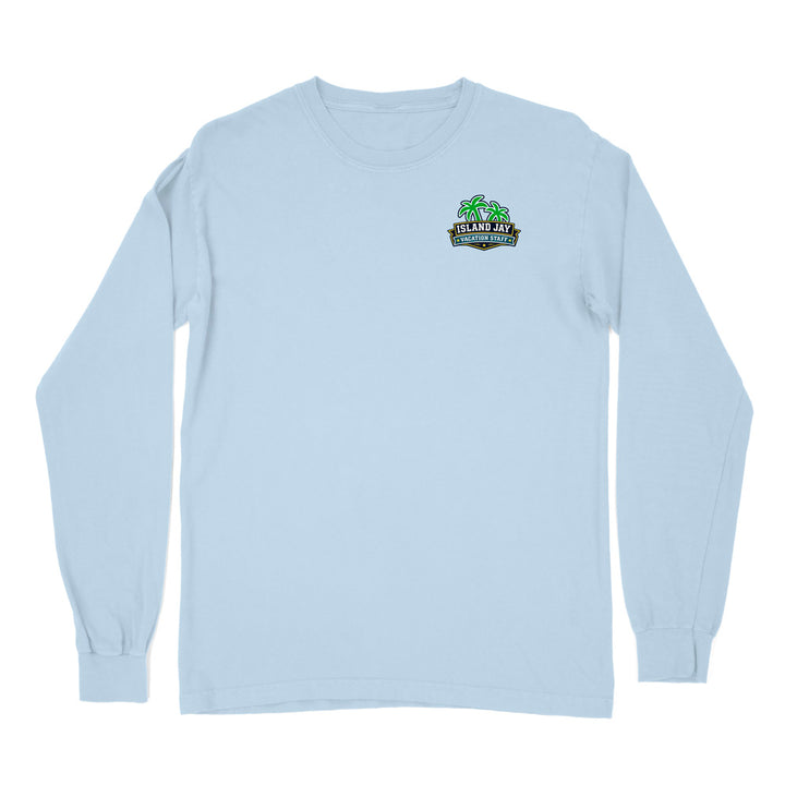 A light blue long-sleeve crewneck t-shirt with a small green and black graphic on the left chest reading 'Islands Jet Transportation'.
