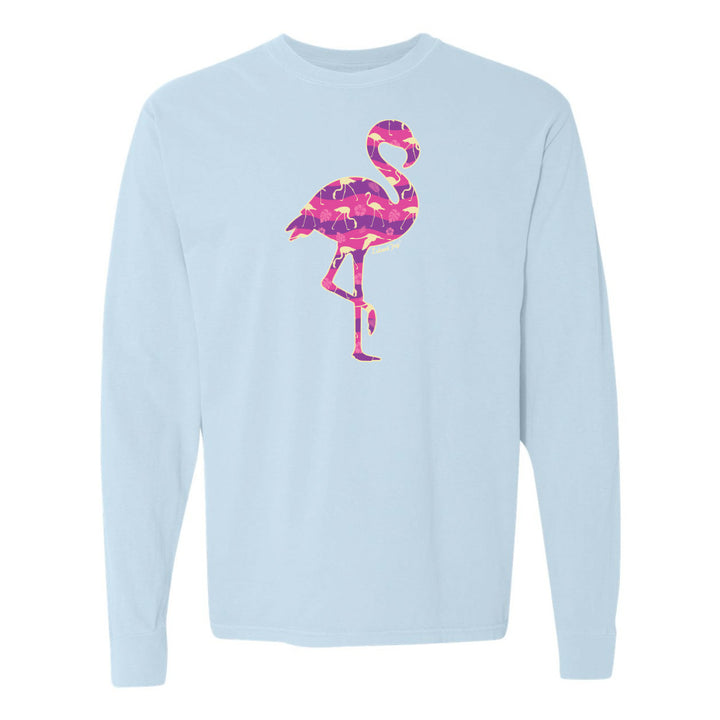 Light blue long-sleeve shirt with a pink flamingo design on a white background