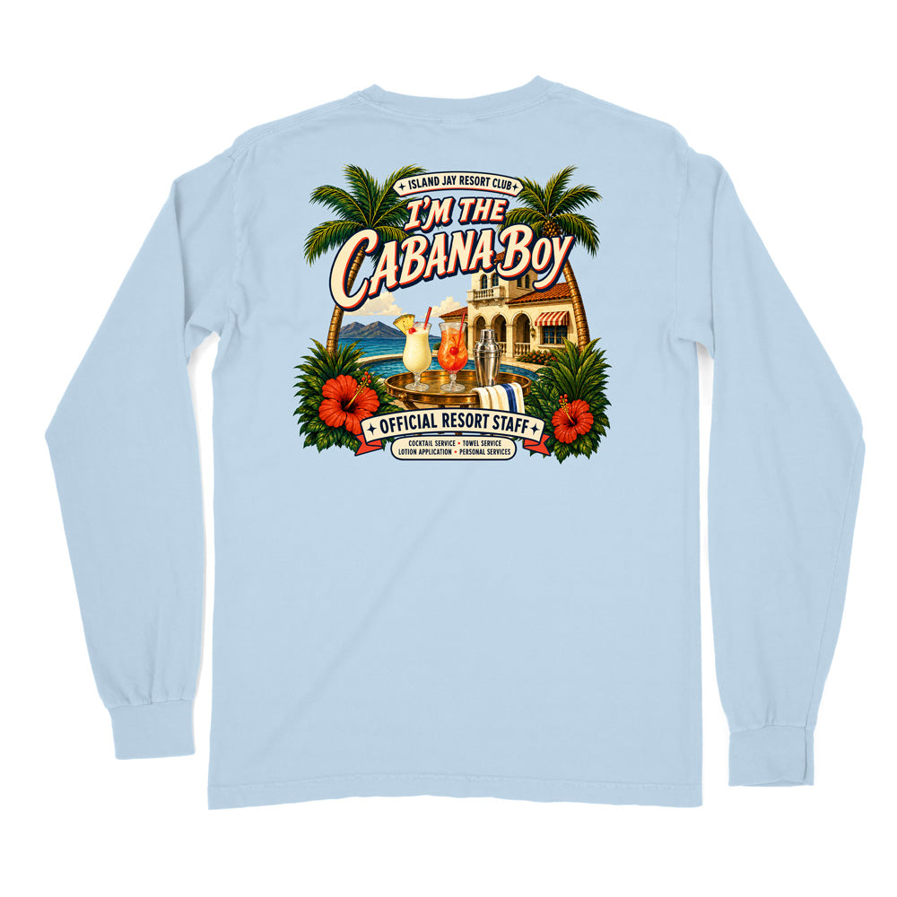 A light blue long-sleeve t-shirt shown from the back, featuring a large, colorful graphic print of a tropical resort scene with palm trees, hibiscus flowers, and a cocktail. The graphic includes the text 'I'M THE CABANA BOY' and 'OFFICIAL RESORT STAFF'.