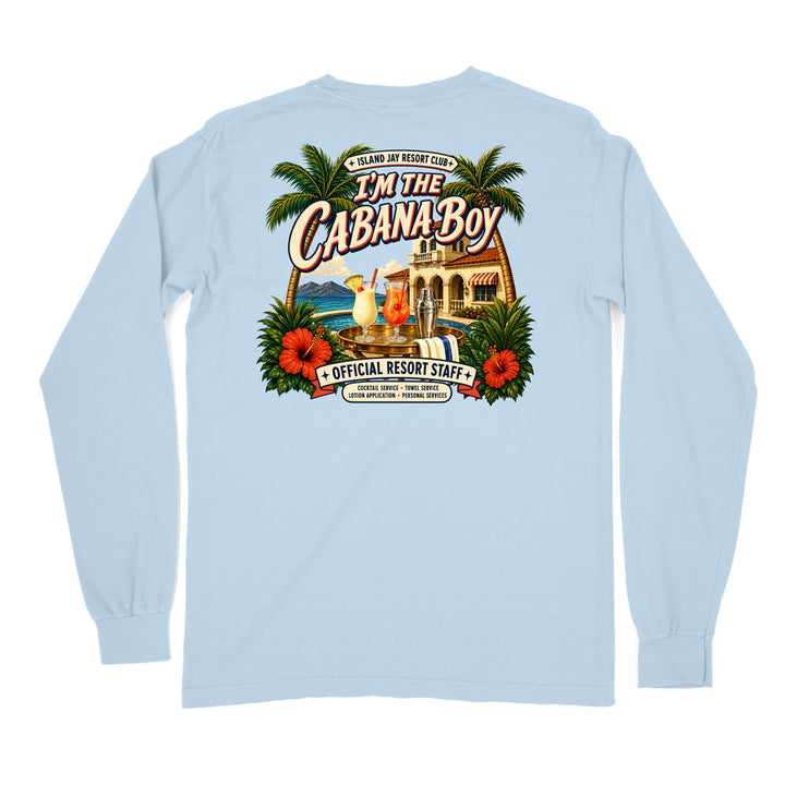 A light blue long-sleeve t-shirt shown from the back, featuring a large, colorful graphic print of a tropical resort scene with palm trees, hibiscus flowers, and a cocktail. The graphic includes the text 'I'M THE CABANA BOY' and 'OFFICIAL RESORT STAFF'.