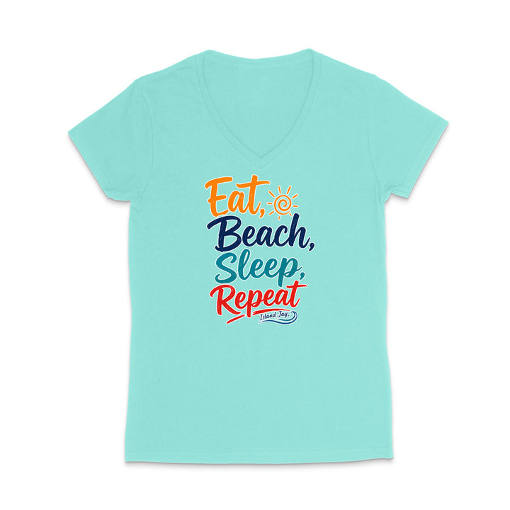 A light aqua V-neck t-shirt with a colorful graphic text print reading 'Eat, Beach, Sleep, Repeat' on the front, displayed against a solid white background.