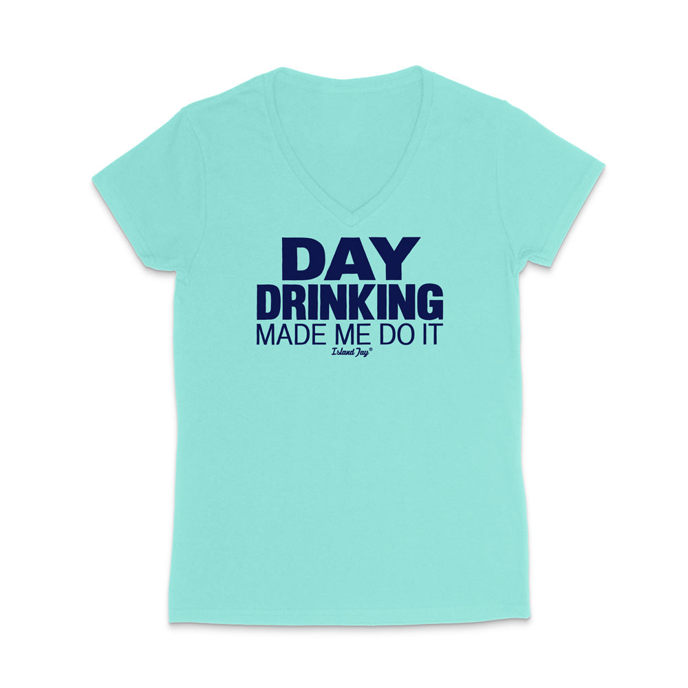A light aqua V-neck t-shirt with the slogan 'DAY DRINKING MADE ME DO IT' printed in dark navy blue on the chest, displayed on a clean white background.