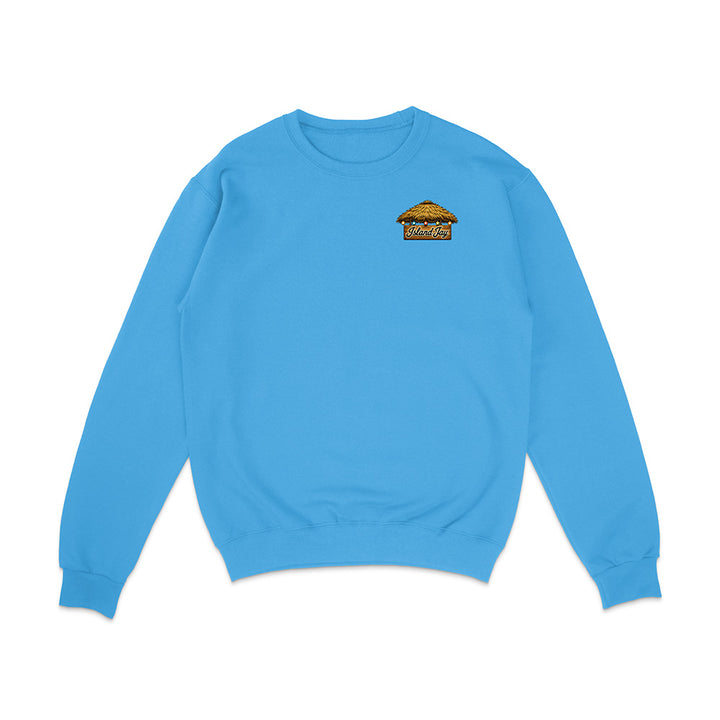A light blue crewneck sweatshirt with a small graphic of a burger on the left chest, displayed on a clean white background.