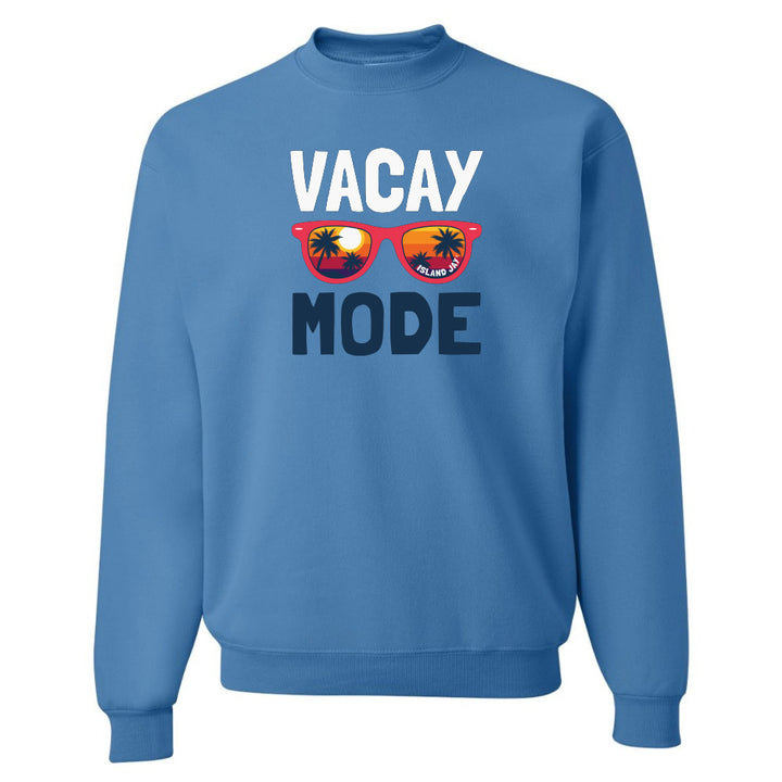 Blue sweatshirt with 'VACAY MODE' text and sunglasses graphic on a white background