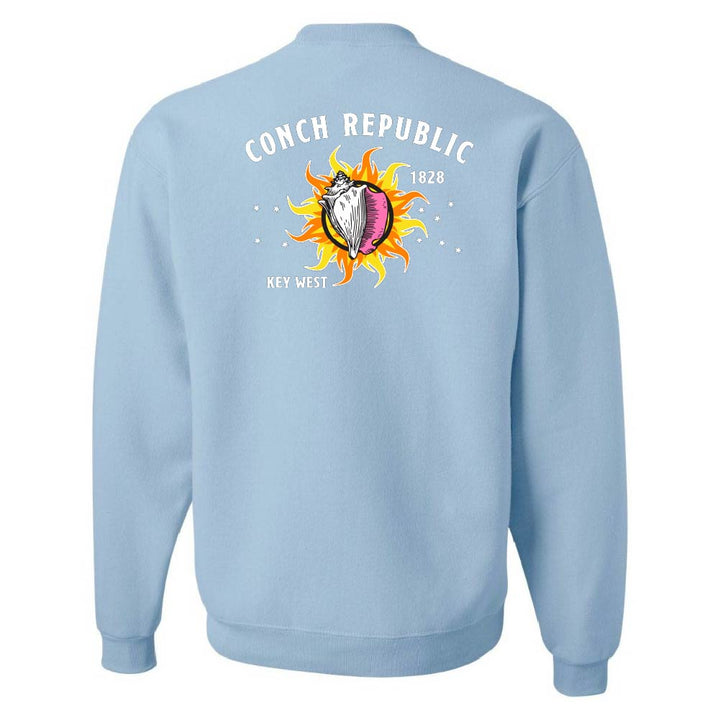 Light blue sweatshirt with a colorful graphic and text on the back against a white background