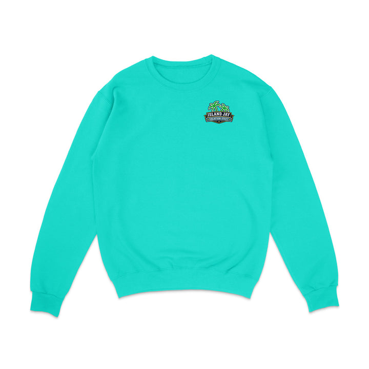 A bright turquoise crewneck sweatshirt with a small graphic on the left chest featuring a green skull and the text 'SKULLS ARE EATERS OF PEOPLE'. The sweatshirt is displayed flat against a solid white background.