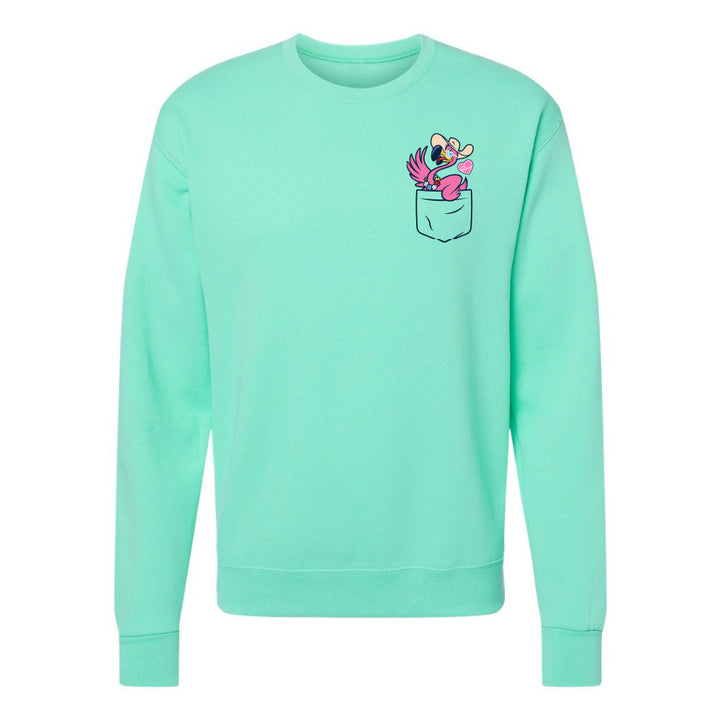 Mint green sweatshirt with a graphic of a pocket and cartoon character on a white background