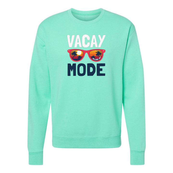 Mint green sweatshirt with 'Vacay Mode' text and sunglasses graphic on a white background