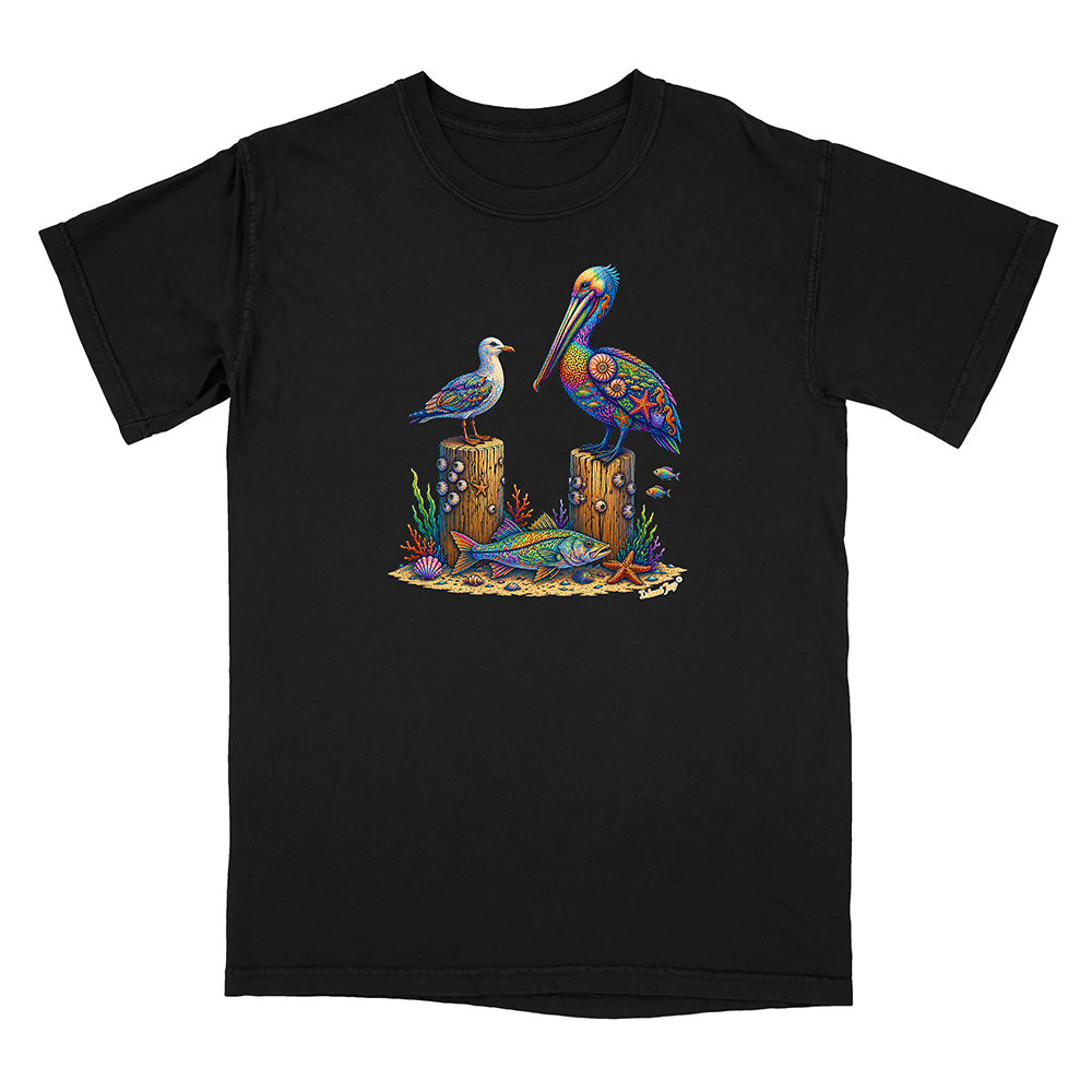 Black t-shirt with a colorful design of a pelican, seagull, and fish on a white background