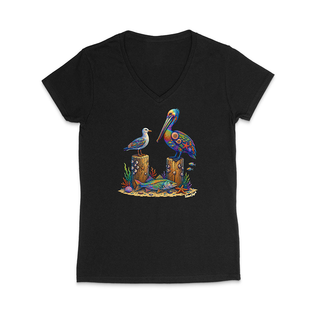 Black V-neck t-shirt with a colorful pelican and fish design on a white background