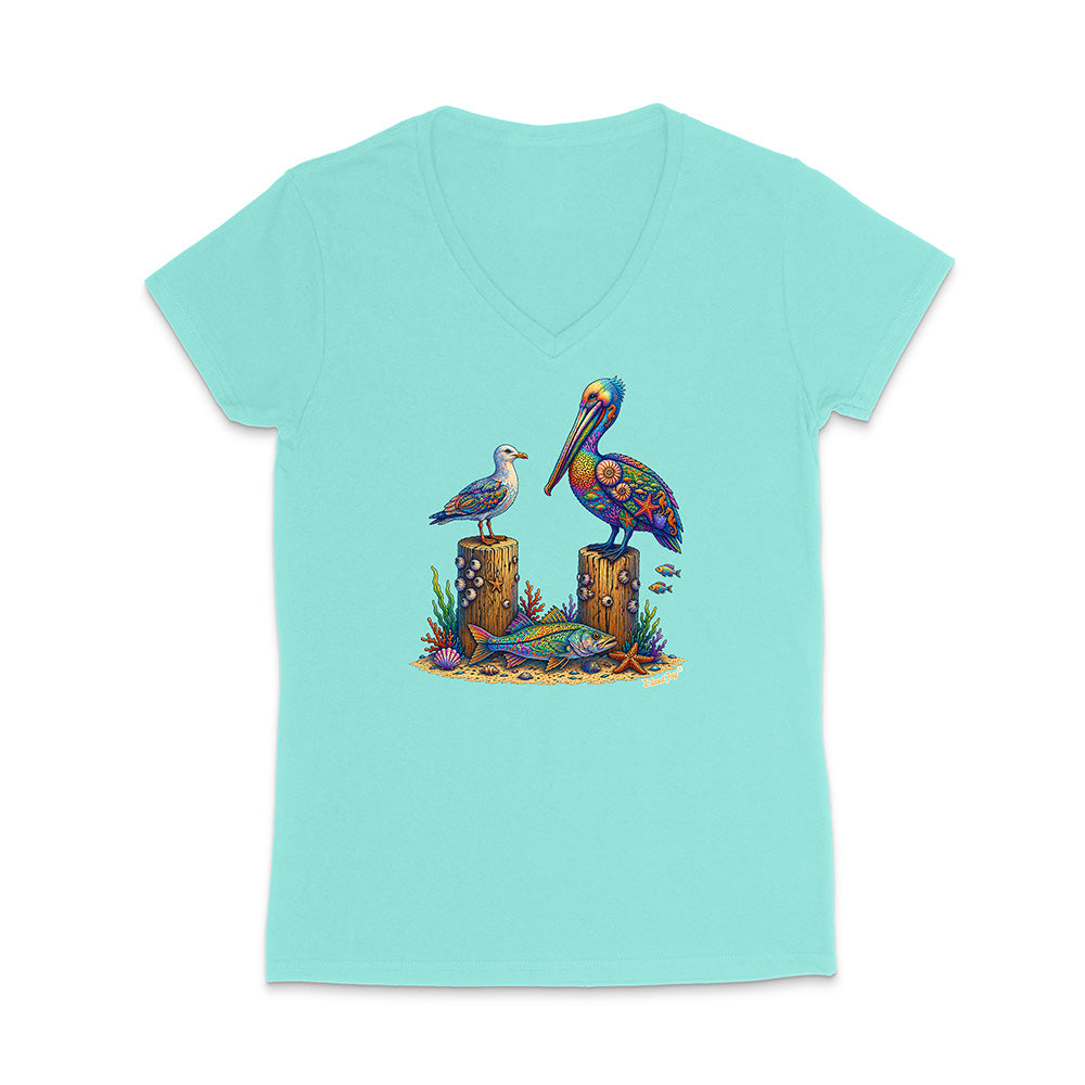 Mint green t-shirt with a colorful pelican and seagull design on a white background