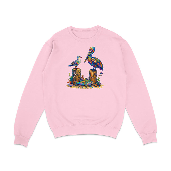 Pink sweatshirt with a colorful pelican design on a white background