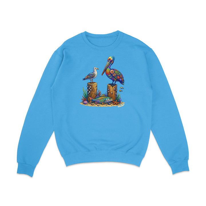 Blue sweatshirt with a colorful pelican design on a white background