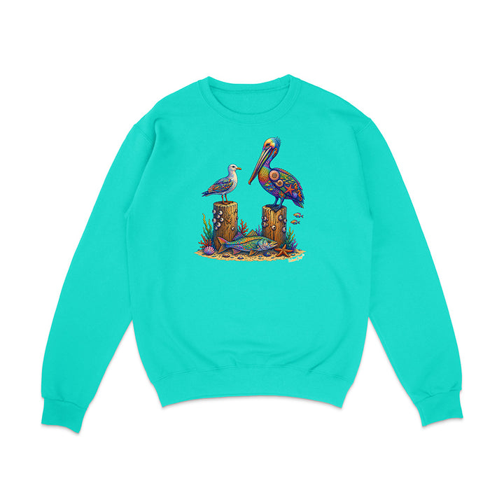 Turquoise sweatshirt with a colorful pelican design on a white background
