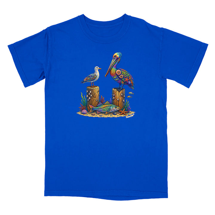 Blue t-shirt with a colorful graphic of two birds and a fish on a white background