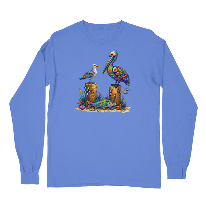 Blue long-sleeve shirt with a colorful pelican design on a white background