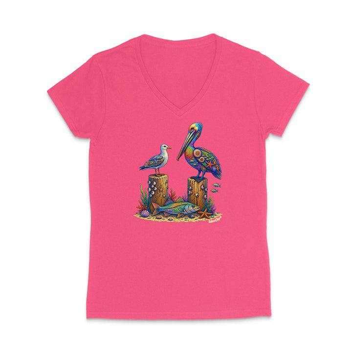 Pink V-neck t-shirt with a colorful pelican design on a white background