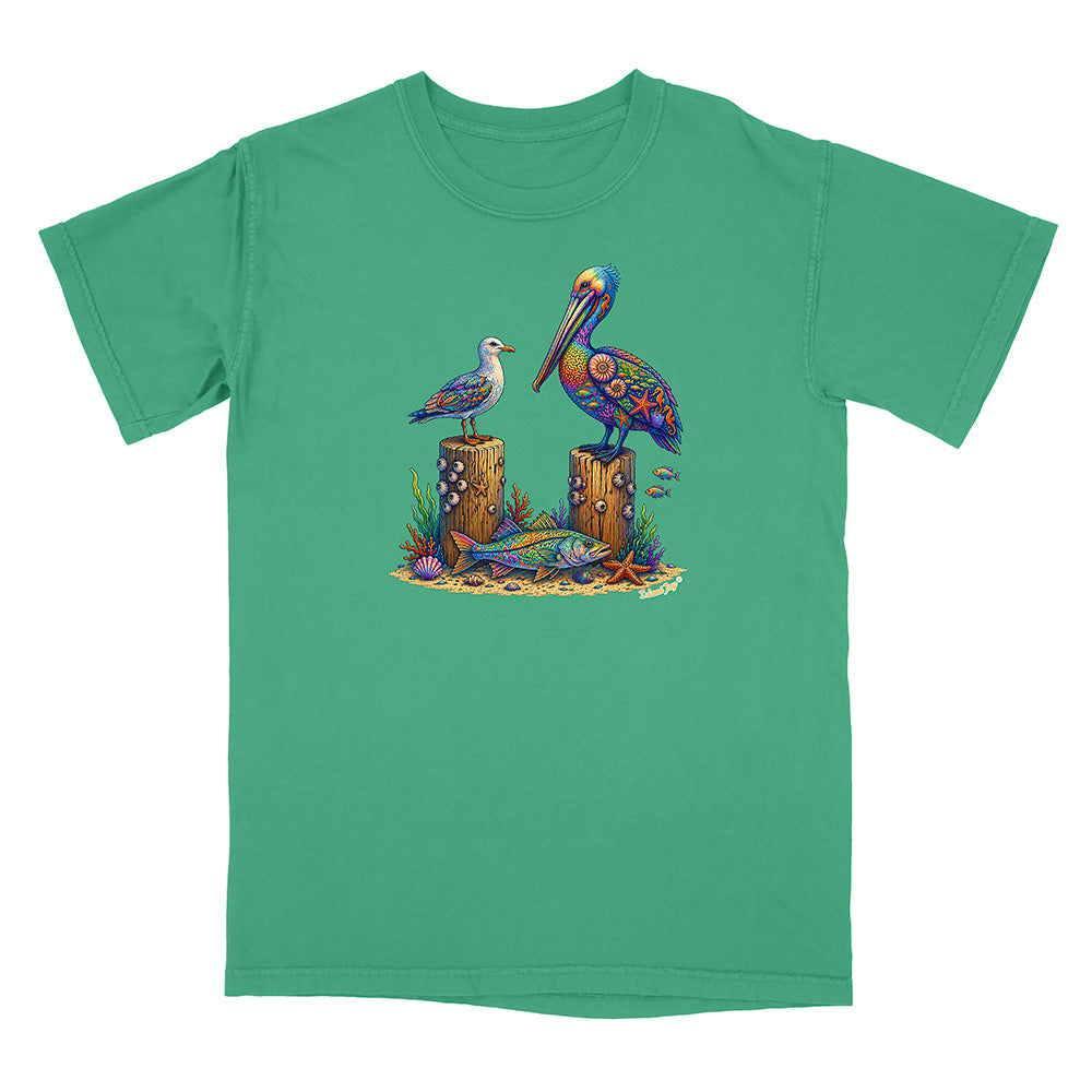 Green t-shirt with a colorful graphic of two birds and marine life on a white background