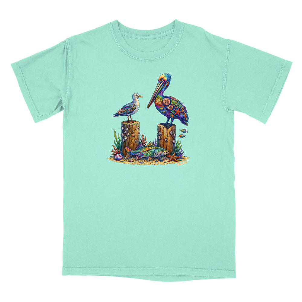 Mint green t-shirt with a colorful graphic of two birds on posts with fish and coral.