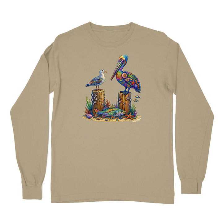 Beige long-sleeve shirt with a colorful pelican design on a white background