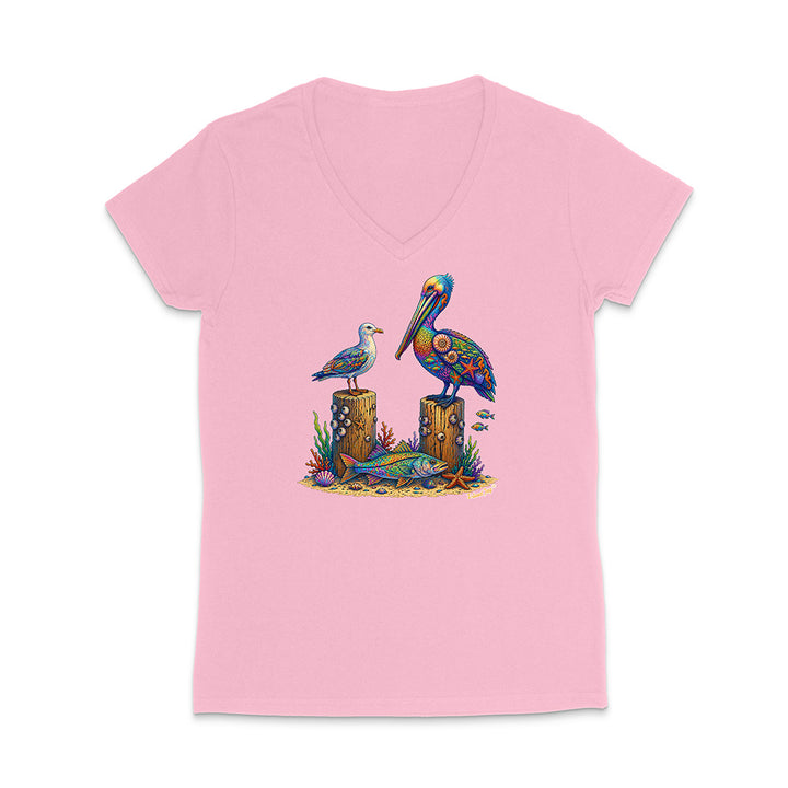 Pink t-shirt with a colorful pelican design on a white background