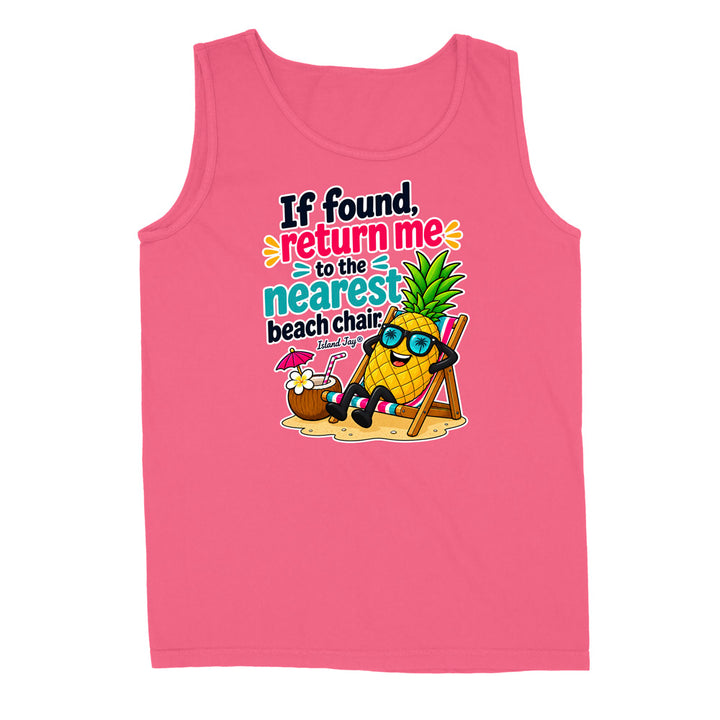 A pink sleeveless tank top with a colorful graphic on the front featuring a pineapple character wearing sunglasses and reclining on a beach chair next to a coconut drink, with the text 'If found, return me to the nearest beach chair.'.