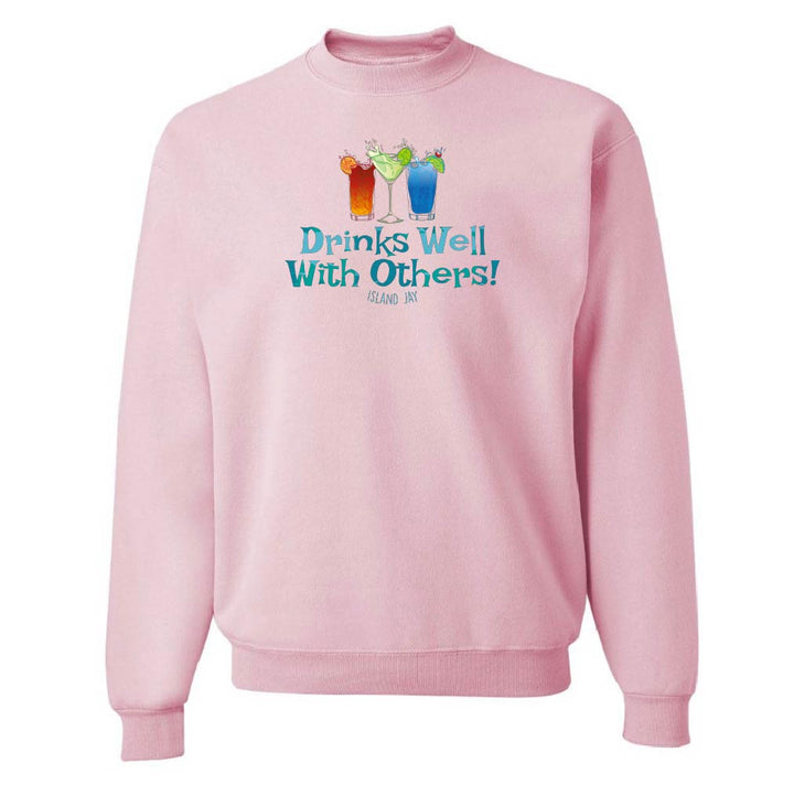 Pink sweatshirt with 'Drinks Well With Others!' text and graphics on a white background