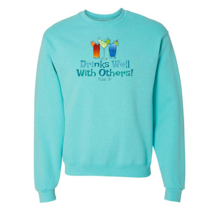 Turquoise sweatshirt with 'Drinks Well With Others!' text and cocktail graphics on a white background