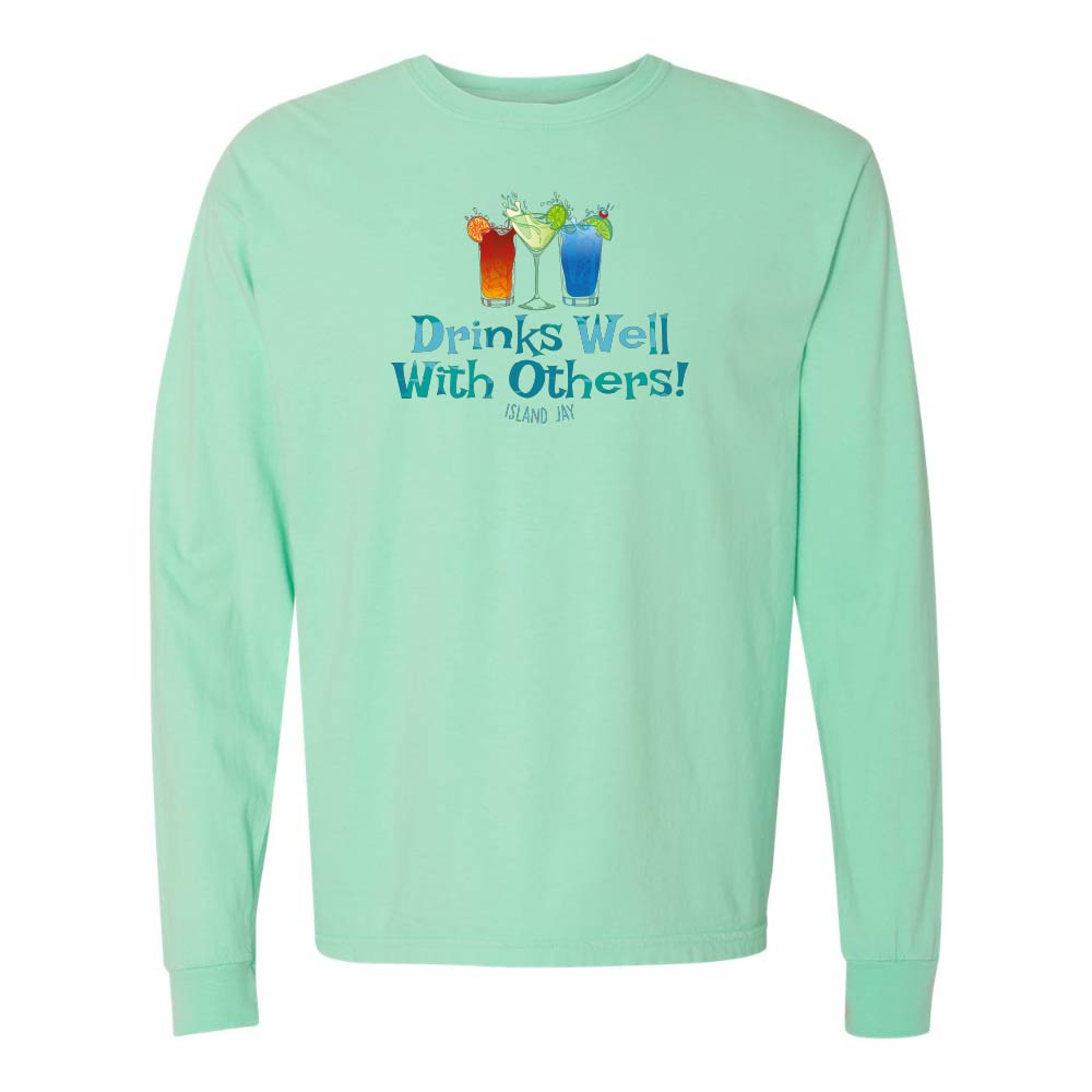 Light green long sleeve T-shirt with mixed drinks graphic and text reading "Drinks Well With Others!"