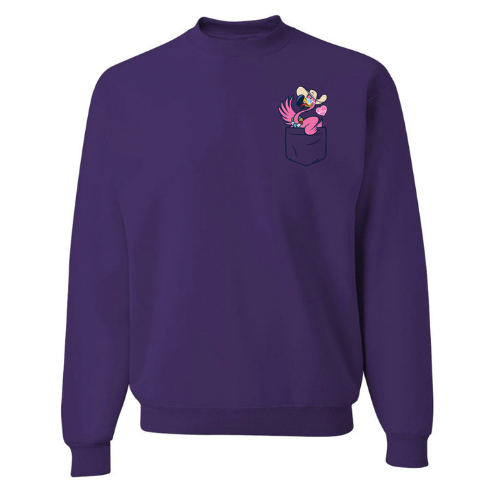 Purple sweatshirt with a cartoon character design on the chest pocket against a white background
