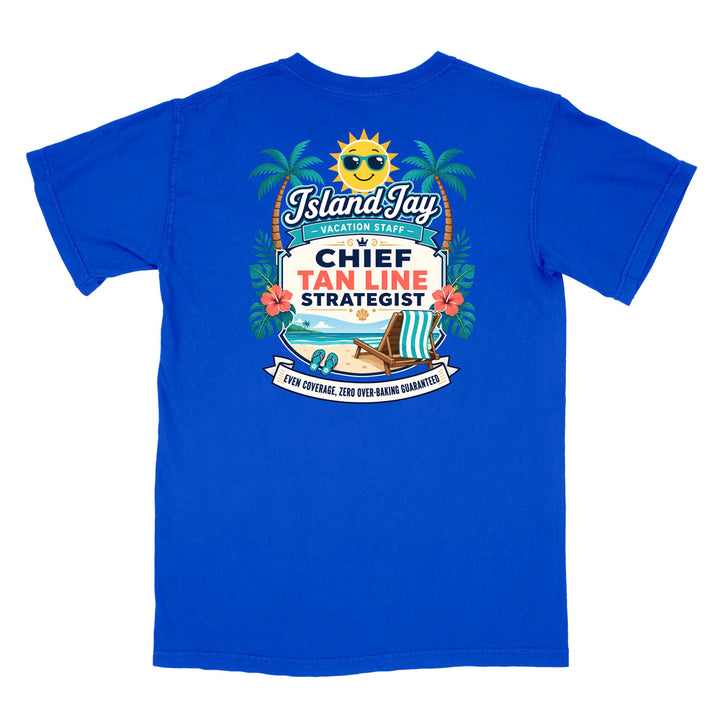A blue short-sleeve t-shirt with a colorful graphic print on the front. The graphic features a smiling sun wearing sunglasses, palm trees, a beach scene, and text that reads 'Island Jay Vacation Staff by CHIEF TAN LINE STRATEGIST'.