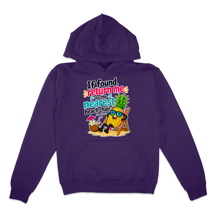 A purple pullover hoodie with a colorful graphic on the chest featuring a pineapple character wearing sunglasses and a beach chair next to a coconut drink, with the text 'If found, return me to the nearest beach chair'.