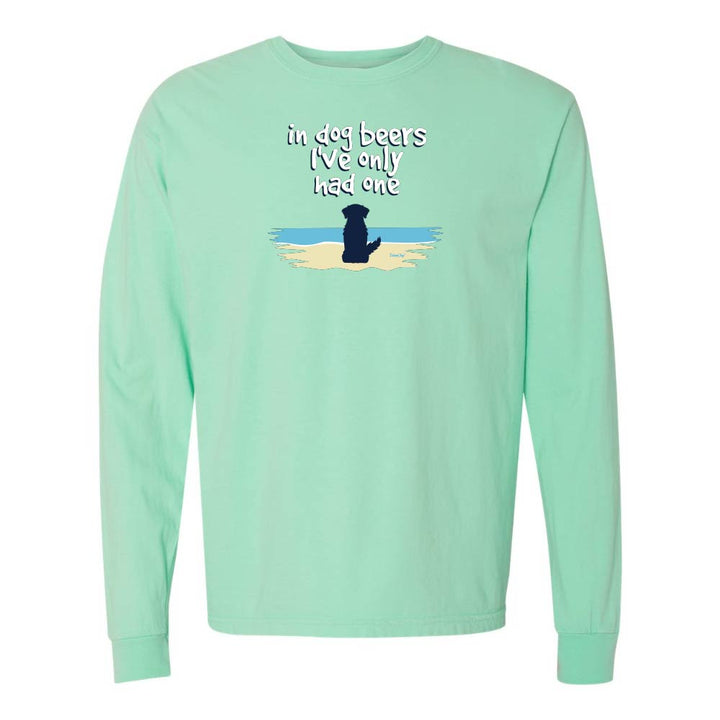 Mint green Long sleeve shirt with a cute dog on a beach graphic and text reading "In dog beers I've only had one".