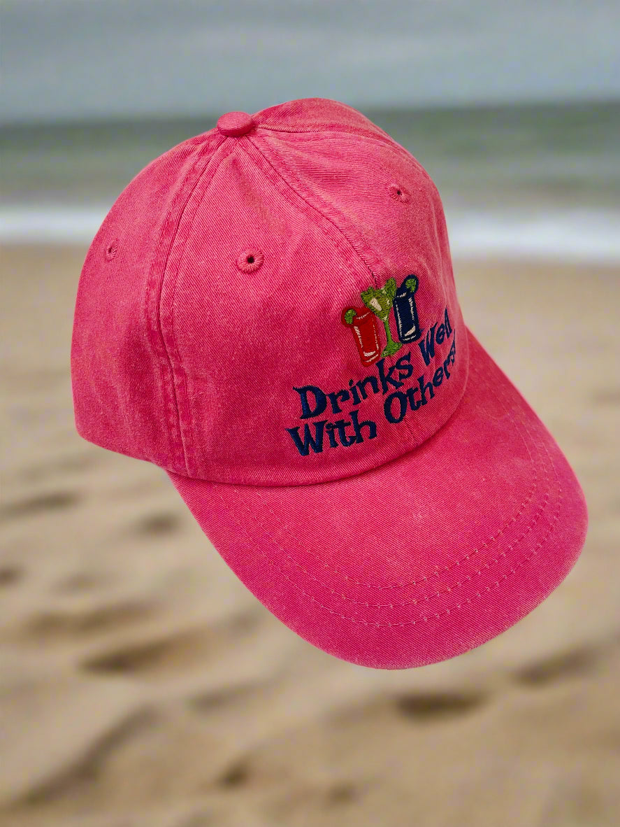 Drinks well with others, hot pink hat