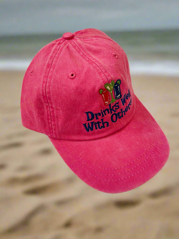 Drinks well with others, hot pink hat