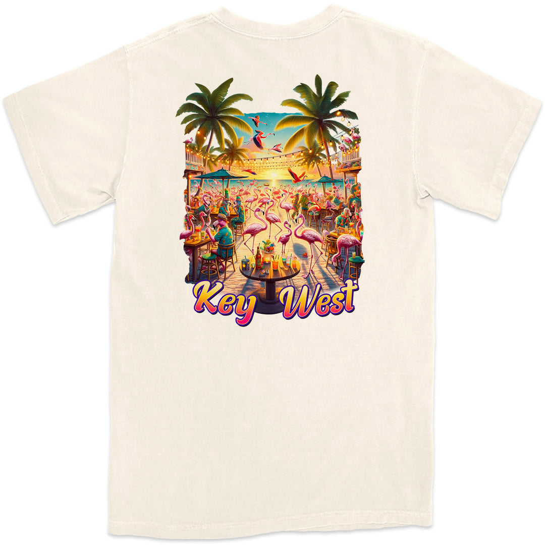 Key West Flamingo Party T-Shirt Natural color. Showing lots of flamingos having a party on the shores of key West. Drinking lots of concoctions and enjoying their time with friends.  
