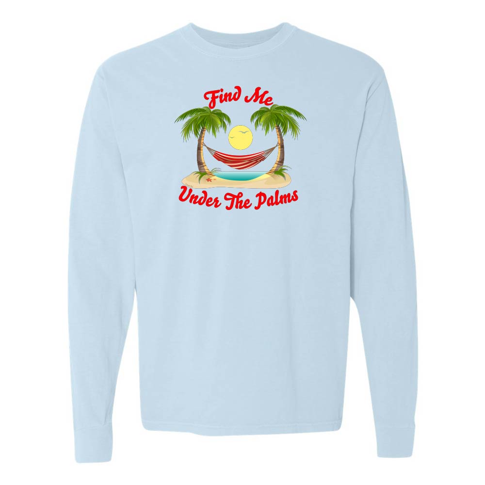 Light blue Longsleeve T-Shirt with beach, hammock, and palm trees graphic and text reading "Find Me Under The Palms".