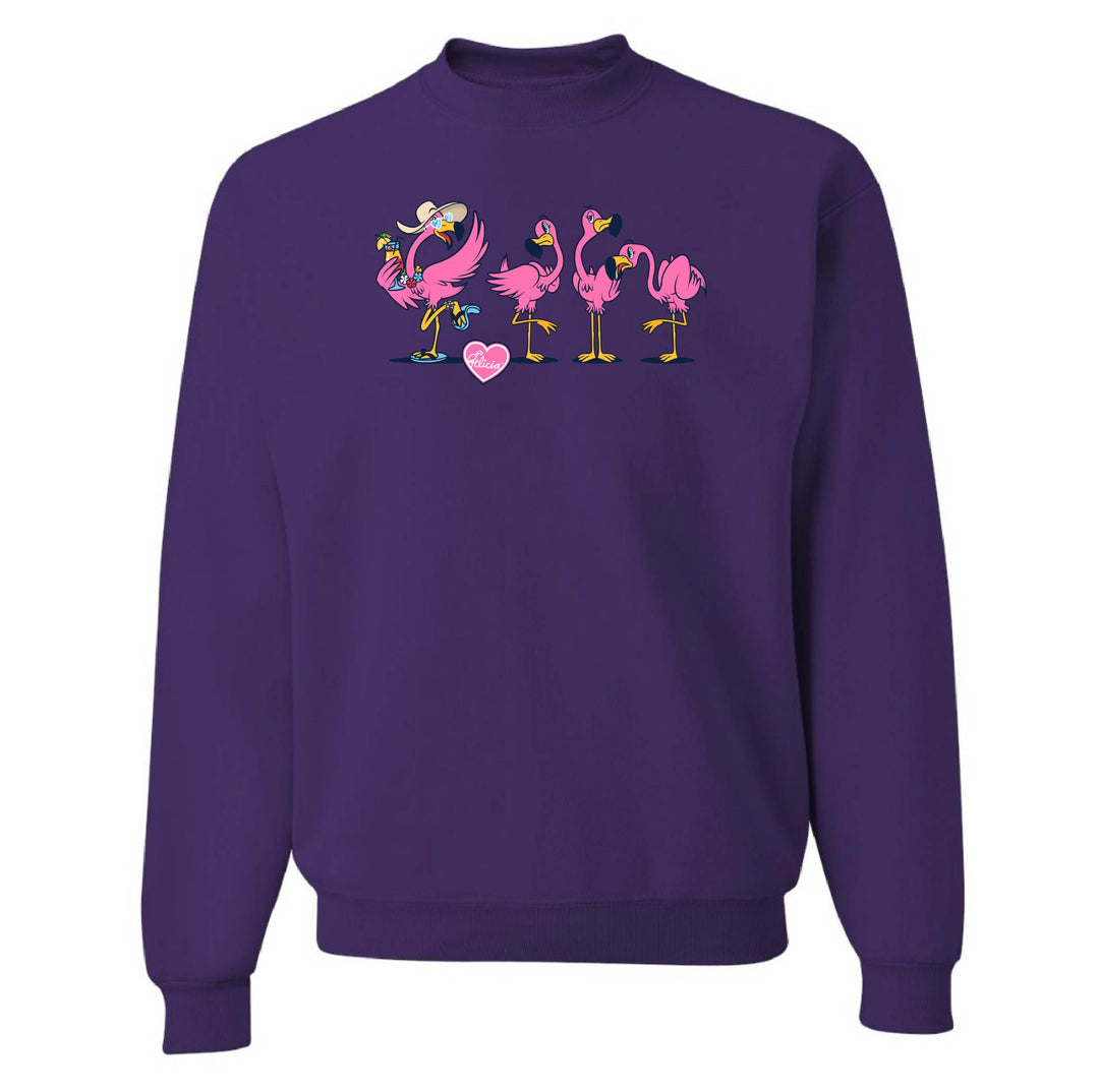 Purple sweatshirt with pink flamingo design on a white background
