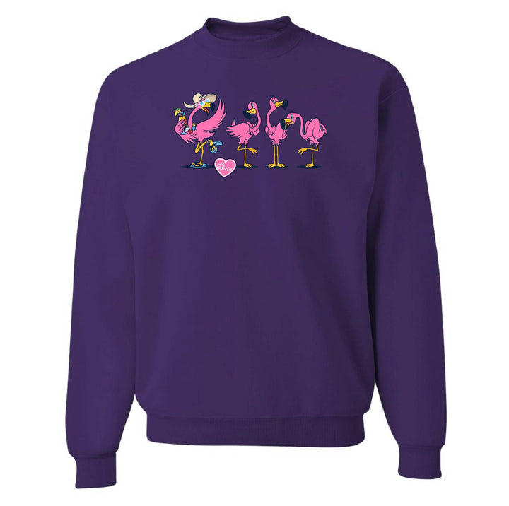 Purple sweatshirt with pink flamingo design on a white background