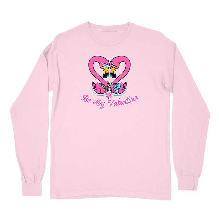 Pink long-sleeve shirt with a heart design and 'Be My Valentine' text on a white background