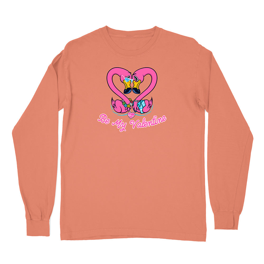 Coral long-sleeve shirt with cartoon flamingos and 'Be My Valentine' text on a white background
