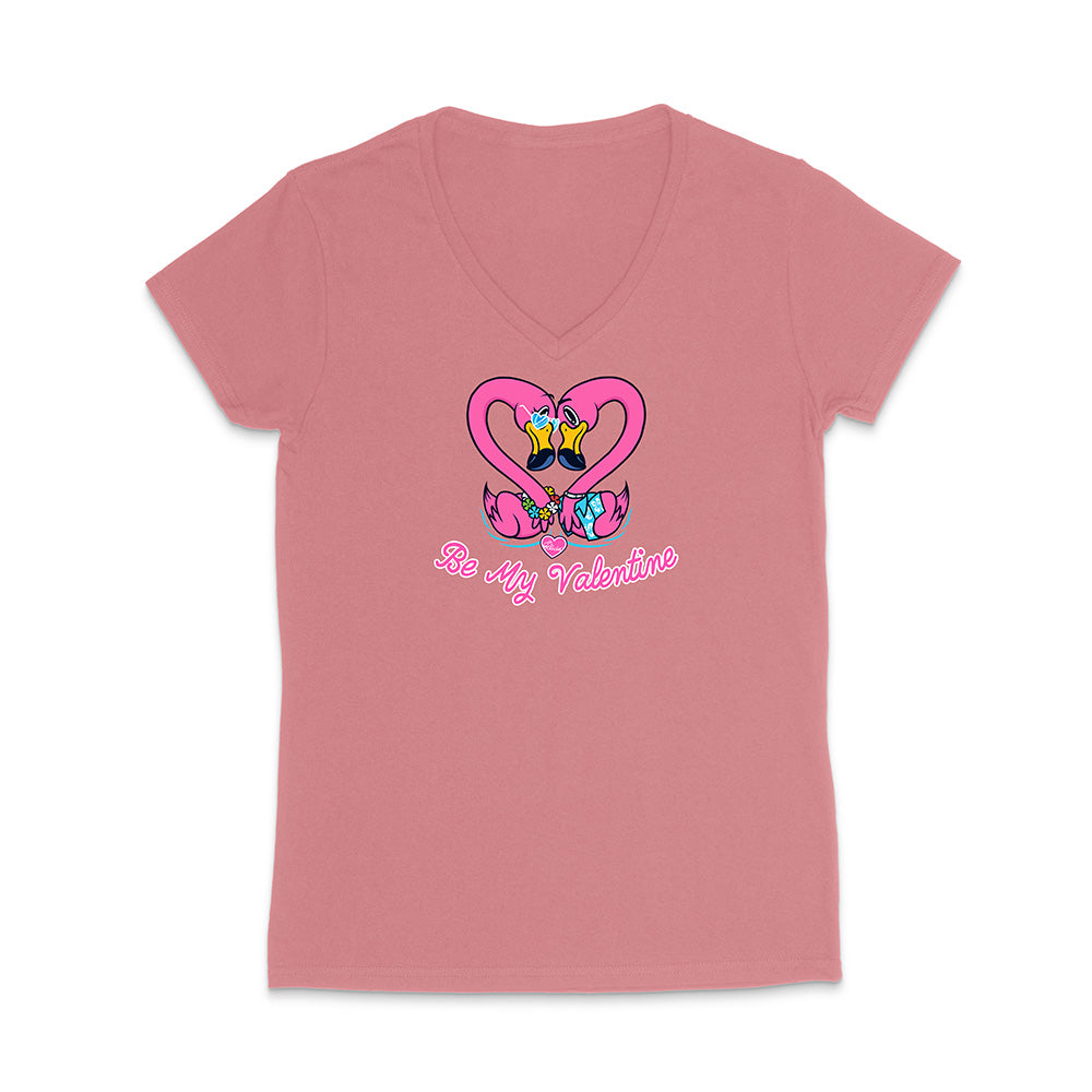 Pink t-shirt with cartoon design and text on a white background