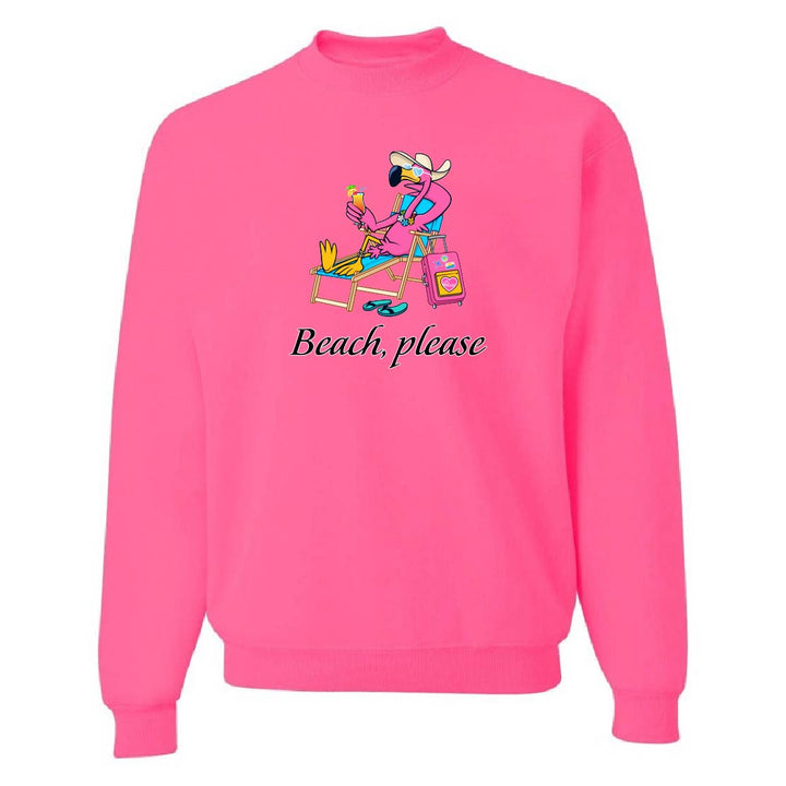 Pink sweatshirt with a graphic of a person at the beach and 'Beach, please' text on a white background.